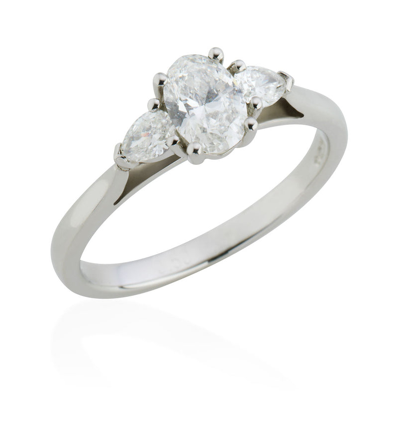 Platinum Three Stone Oval Cut and Pear Cut Diamond Ring