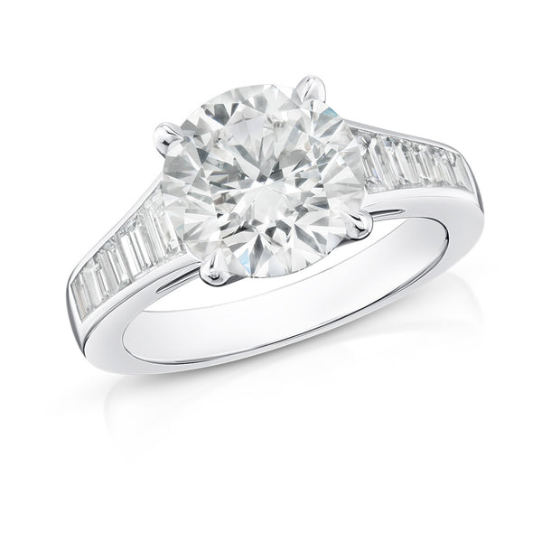 Platinum Single Stone Round Brilliant Cut Diamond Ring with Diamond Channel Set Shoulders